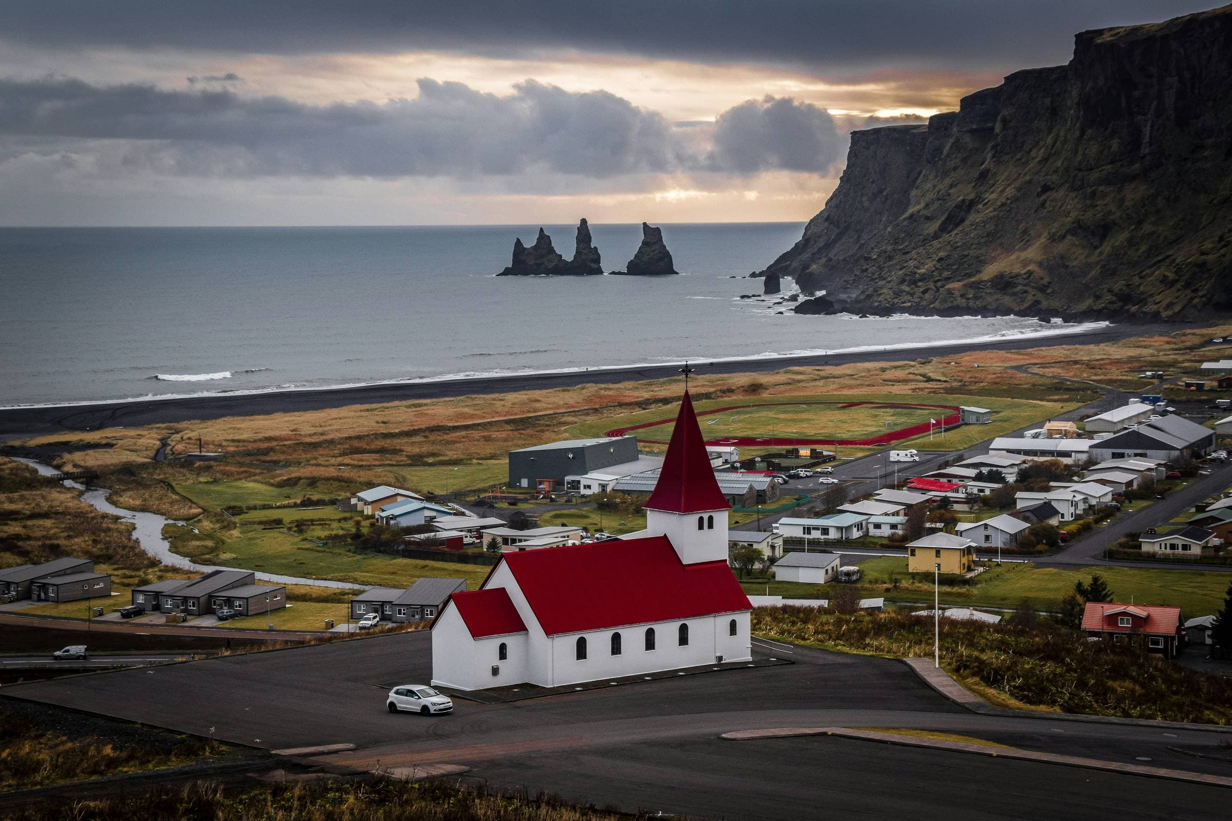 Vik, Iceland’s southernmost village, with views of the coastline and surrounding mountains.